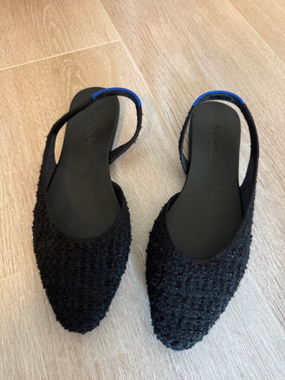Rothy's Black Slingback Mules with Blue Trim